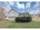 Backyard with green grass and mature trees at 6405 Grafton Dr, Austell, GA 30168