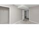 A basement room features an open closet and an open door at 6405 Grafton Dr, Austell, GA 30168