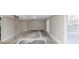 Unfinished basement with concrete floor, support beam and window at 6405 Grafton Dr, Austell, GA 30168
