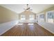 Sun-filled living room with vaulted ceiling, wainscotting and many windows overlooking the backyard at 1692 Cumberland Trce, Acworth, GA 30102