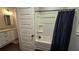 The bathroom features granite countertops, shower, tub, and toilet at 2317 Pleasant Grove Rd, Temple, GA 30179