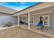 Relaxing covered patio with serene views, ideal for enjoying the outdoors in comfort and style at 2317 Pleasant Grove Rd, Temple, GA 30179