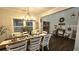 Dining room showcasing an open layout with rustic decor, adjacent to the front entry and plenty of natural light at 2317 Pleasant Grove Rd, Temple, GA 30179