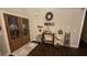 Inviting foyer with rustic decor, wood flooring, and a decorative wreath hanging on the wall at 2317 Pleasant Grove Rd, Temple, GA 30179