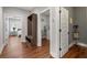 Hallway view with access to bedroom and laundry room at 2317 Pleasant Grove Rd, Temple, GA 30179