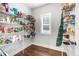 Spacious walk-in pantry with ample shelving for organized storage, enhancing kitchen functionality at 2317 Pleasant Grove Rd, Temple, GA 30179