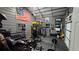 Well-equipped workout room features gym equipment, weights, and motivational artwork for a complete fitness experience at 2317 Pleasant Grove Rd, Temple, GA 30179
