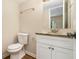 Bathroom with vanity, granite countertop, new fixtures, and tile flooring at 2339 Chevy Chase Ln, Decatur, GA 30032