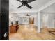 Open basement layout features stone flooring, decorative fireplace, kitchen bar, and an open concept at 746 Amsterdam Ave, Atlanta, GA 30306