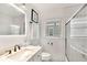 Modern bathroom with white subway tile, updated fixtures, marble vanity top, and glass-enclosed shower at 746 Amsterdam Ave, Atlanta, GA 30306