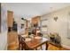 Bright kitchen features light wood cabinets, stainless appliances, granite countertops, and a serving bar at 746 Amsterdam Ave, Atlanta, GA 30306