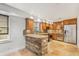 Well-appointed kitchen with stone accents, modern appliances, and custom cabinetry with under cabinet lighting at 746 Amsterdam Ave, Atlanta, GA 30306