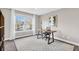 Bright home office with large window, modern desk, and comfortable seating area at 8303 Santa Fe Pkwy, Atlanta, GA 30350