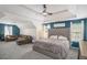 Spacious main bedroom with sitting area, decorative ceiling, and ample natural light at 1297 Partridge Ln, Riverdale, GA 30296