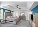 Spacious main bedroom with king size bed, and decorative ceiling, ample closet space at 1297 Partridge Ln, Riverdale, GA 30296