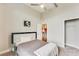 Bedroom featuring carpeted floor, closet, neutral walls and ceilings, and door that looks into other rooms at 3820 Roswell Ne Rd # 902, Atlanta, GA 30342