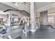 Spacious community gym with modern equipment, high ceilings, and natural light at 3820 Roswell Ne Rd # 902, Atlanta, GA 30342