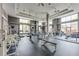 Well-lit fitness center with ample exercise equipment and large windows providing natural light at 3820 Roswell Ne Rd # 902, Atlanta, GA 30342