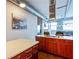 Spacious kitchen with a gas cooktop on island, cherry cabinets, and city views at 3820 Roswell Ne Rd # 902, Atlanta, GA 30342