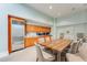 Inviting community kitchenette with stainless steel refrigerator and spacious wooden table with seating at 3820 Roswell Ne Rd # 902, Atlanta, GA 30342