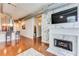 Elegant living room with a marble fireplace, and an open kitchen concept at 3820 Roswell Ne Rd # 902, Atlanta, GA 30342