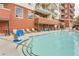 Outdoor swimming pool with lounge chairs and umbrellas, perfect for relaxing and enjoying the weather at 3820 Roswell Ne Rd # 902, Atlanta, GA 30342