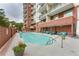 Community swimming pool with comfortable lounge seating and beautifully landscaped surroundings at 3820 Roswell Ne Rd # 902, Atlanta, GA 30342
