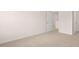 Bedroom with carpet and access to the hallway and closet at 636 Kimberwick Dr, Locust Grove, GA 30248