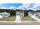 Charming two-story home with landscaped yard, concrete driveway and inviting front entrance at 636 Kimberwick Dr, Locust Grove, GA 30248