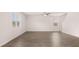 Open-concept living area featuring new flooring and a modern ceiling fan at 636 Kimberwick Dr, Locust Grove, GA 30248