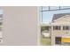 Room with view of neighboring home, visible through window with blinds at 636 Kimberwick Dr, Locust Grove, GA 30248