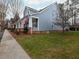 Home featuring a well-manicured lawn and inviting front porch at 3036 Lassiter Rd, Marietta, GA 30062