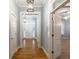 Bright foyer with hardwood floors, white trim, and elegant lighting fixtures at 3036 Lassiter Rd, Marietta, GA 30062