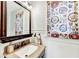 Cozy half bathroom featuring a granite countertop, and decorative wallpaper at 1712 Green Farm Cir, Dacula, GA 30019