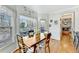 Cozy breakfast nook with access to the deck and a view of the fireplace at 1712 Green Farm Cir, Dacula, GA 30019