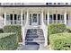 Inviting entrance featuring a decorative wreath and a bright, welcoming front door at 1712 Green Farm Cir, Dacula, GA 30019