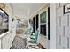 Cozy front porch with rocking chairs perfect for relaxing and enjoying the neighborhood views at 1712 Green Farm Cir, Dacula, GA 30019