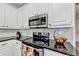 Kitchen featuring granite countertops and stainless steel appliances at 1712 Green Farm Cir, Dacula, GA 30019