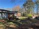 Spacious backyard with mature trees and foliage at 239 Andrea Nw Cir, Lilburn, GA 30047