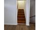 View of staircase featuring hardwood steps at 239 Andrea Nw Cir, Lilburn, GA 30047