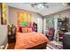 Bedroom featuring an accent wall and filled with natural light from the window at 290 Leigh Kay Dr, Lawrenceville, GA 30046