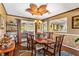 Spacious dining room with unique ceiling and views of the backyard at 290 Leigh Kay Dr, Lawrenceville, GA 30046