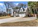 Suburban home with a driveway, two-car garage and well-maintained lawn at 290 Leigh Kay Dr, Lawrenceville, GA 30046