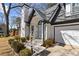 Stylish front entrance showcasing a well-kept walkway and an attached garage at 290 Leigh Kay Dr, Lawrenceville, GA 30046