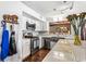 Updated kitchen featuring stainless steel appliances, custom cabinets, and modern lighting fixtures at 290 Leigh Kay Dr, Lawrenceville, GA 30046