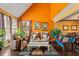 Bright living room with high ceilings, lots of natural light, comfortable seating, and access to the dining room at 290 Leigh Kay Dr, Lawrenceville, GA 30046