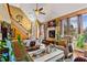 Elegant living room showcasing large windows, a fireplace and multiple seating areas at 290 Leigh Kay Dr, Lawrenceville, GA 30046