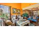 Bright living room featuring high ceilings, large windows, and comfortable seating at 290 Leigh Kay Dr, Lawrenceville, GA 30046