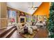 Open-concept living area filled with natural light, a fireplace and stylish decor at 290 Leigh Kay Dr, Lawrenceville, GA 30046