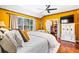 Comfortable main bedroom featuring a walk-in closet and a large window at 290 Leigh Kay Dr, Lawrenceville, GA 30046